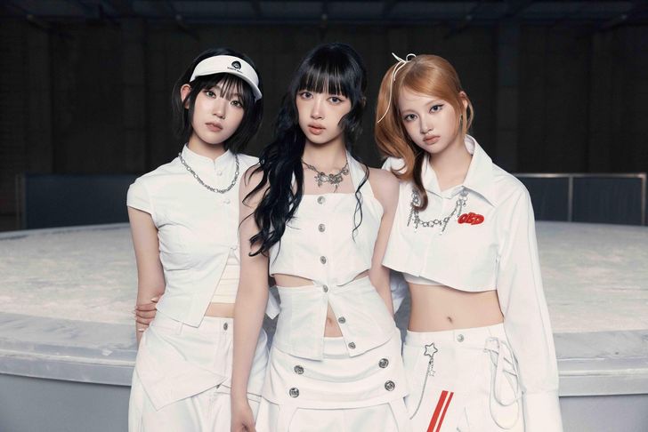From left are K-pop girl group OURBIRTHDAY members Cho Hye-jin, Achiraya and Baby. The trio kicked off the group's predebut with the digital single 'HUNGRY (Side A),' ahead of the full seven-member lineup's debut under JYP Entertainment's subsidiary INNIT Entertainment. Courtesy of INNIT Entertainment 