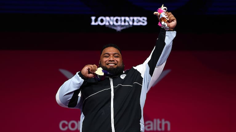 David Liti with his gold medal