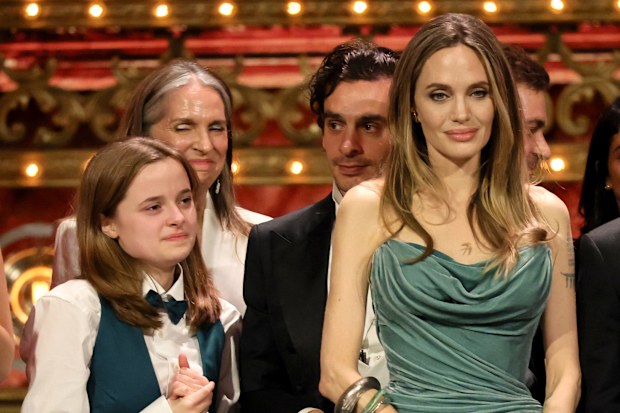 Vivienne Jolie-Pitt and Angelina Jolie accept the Tony Award for Best Musical for their play The Outsiders in June 2024.