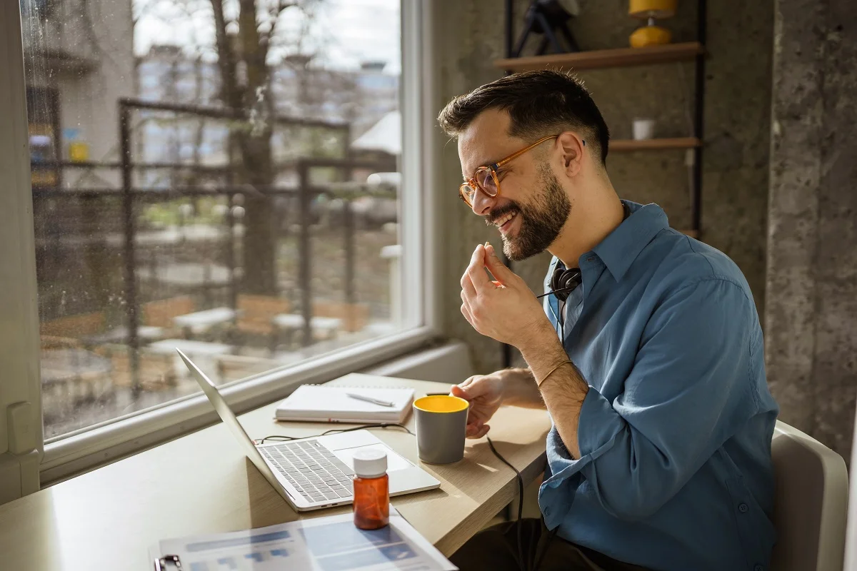 Man taking brain health supplements