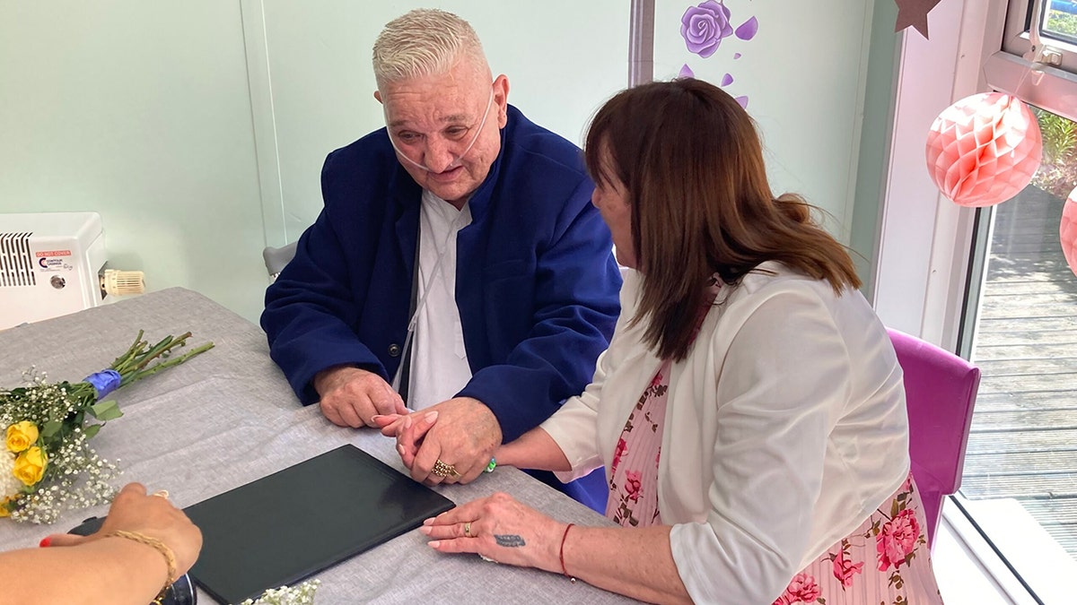 Dean Pennell marrying Kay Beaman at Colchester Hospital.