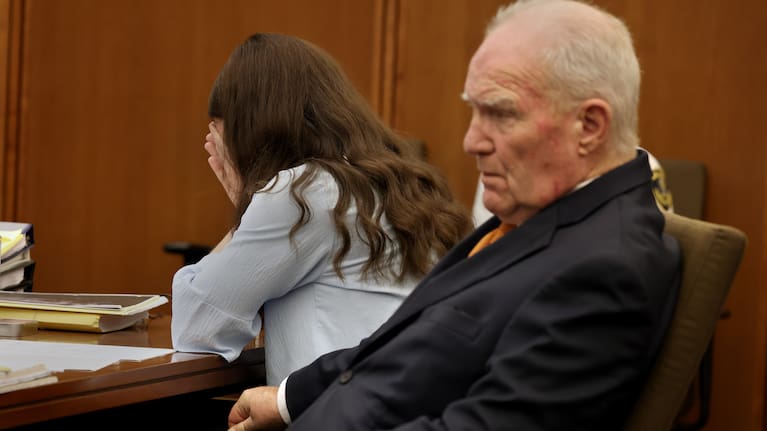 Defense attorney Kevin Reddington and Lindsay Clancy listen to the 911 recording from Jan. 24, 2023, during Clancy's murder trial at Plymouth Superior Court in Plymouth, Mass., on Wednesday, July 29, 2026.