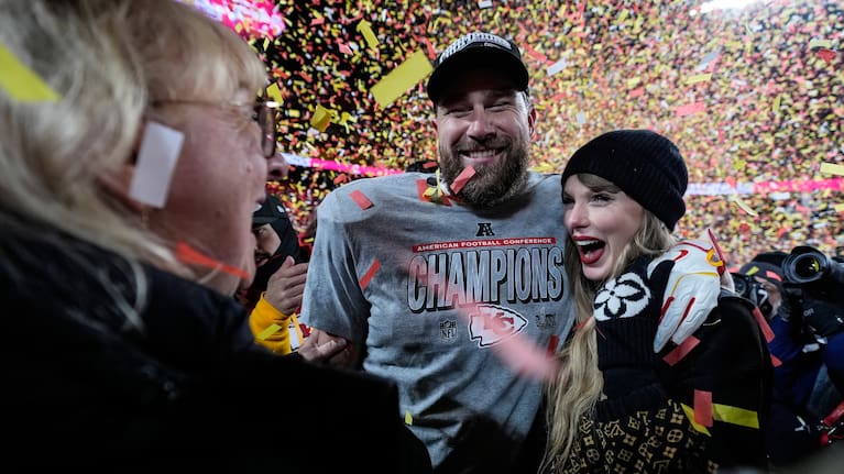 Donna Kelce stands with her son Kansas City Chiefs tight end Travis Kelce and Taylor Swift after the AFC Championship NFL football game against the Buffalo Bills, Jan. 26, 2025