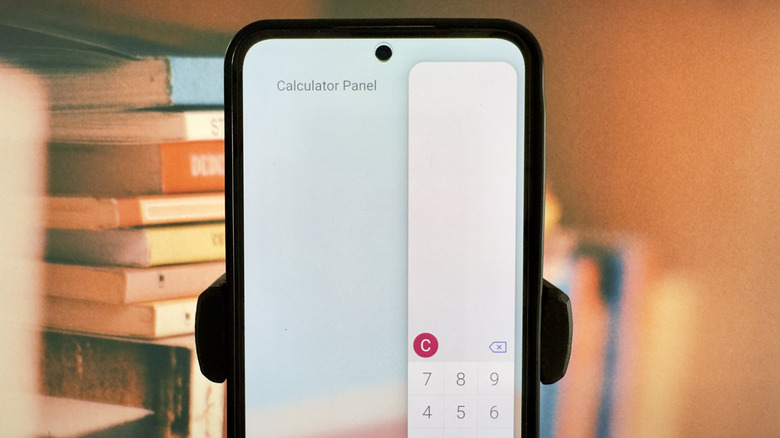 Samsung Galaxy phone showing Calculator Panel app for Edge panel