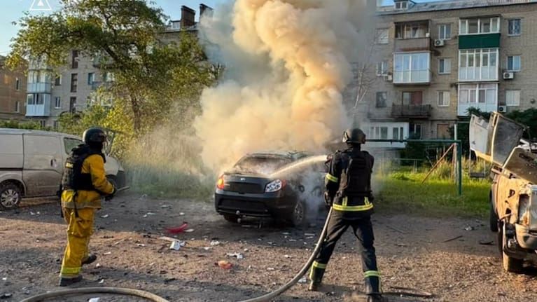 Emergency services personnel work to extinguish a fire following a Russian air attack in Kramatorsk, Donetsk region, Ukraine.