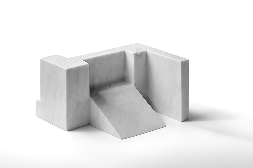 carved from solid carrara marble, abstract house-like objects explore architectural form - 5