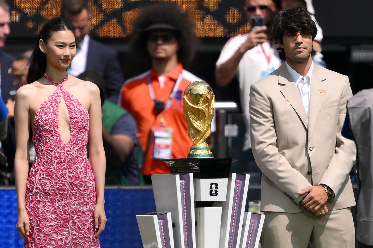 Carlos Alcaraz and Hoyeon present the FIFA World Cup Winners a Trophy before the FIFA World Cup 2026 Final 