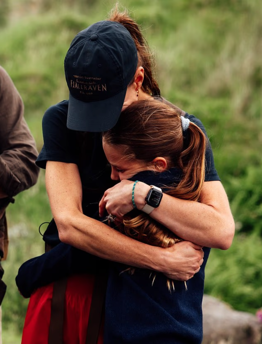The images captured an emotional family reunion after Kate Middleton crossed the finish line