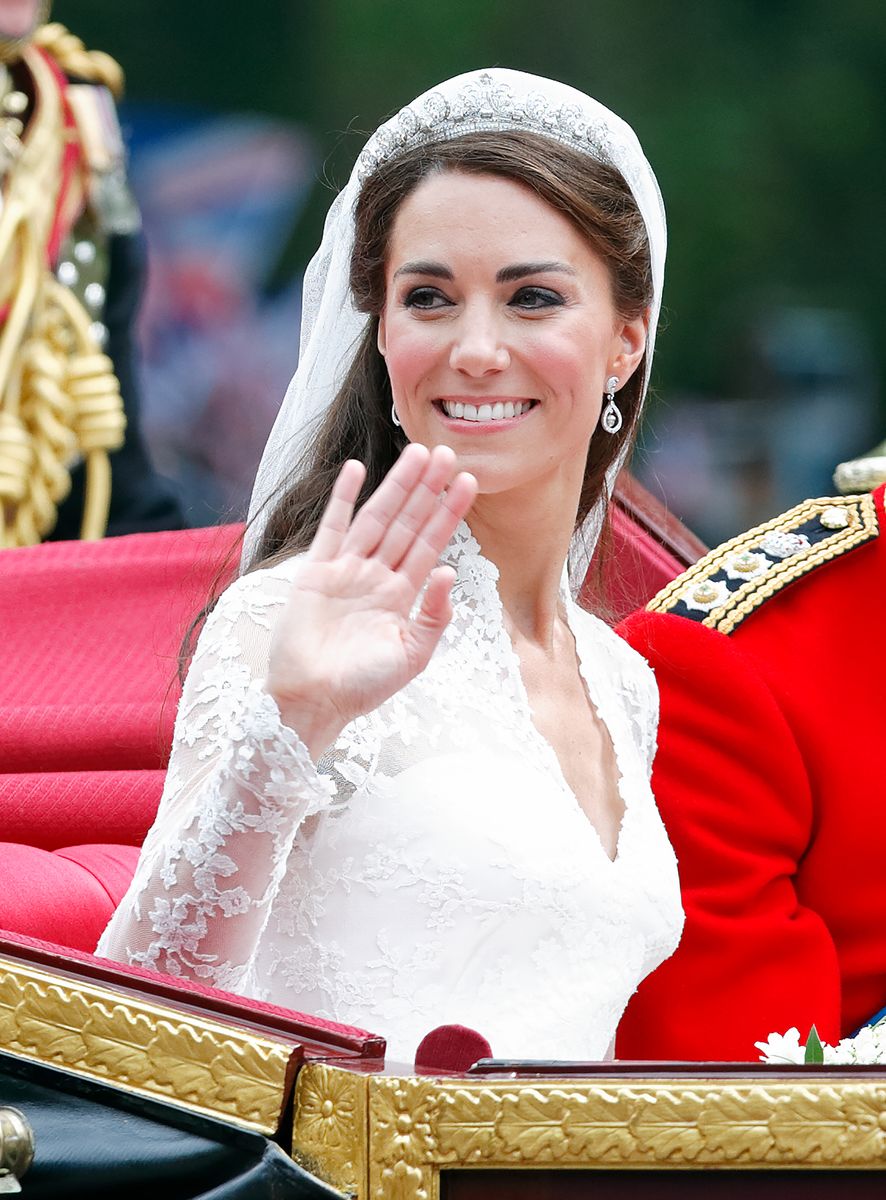 Kate Middleton comes out of Westminster Abbey, with her husband Prince William  following their wedding ceremony, in central London.