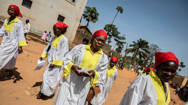 Faithful leave after Sunday Mass at Mudzi-Maria's Cathedral of Our Lady of Grace in Bunia, Congo.