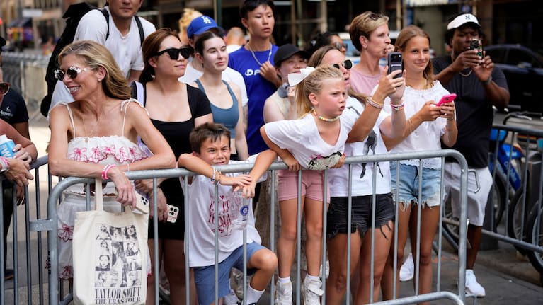 Fans gather outside Madison Square Garden ahead of a reported wedding between Taylor Swift and Travis Kelce.