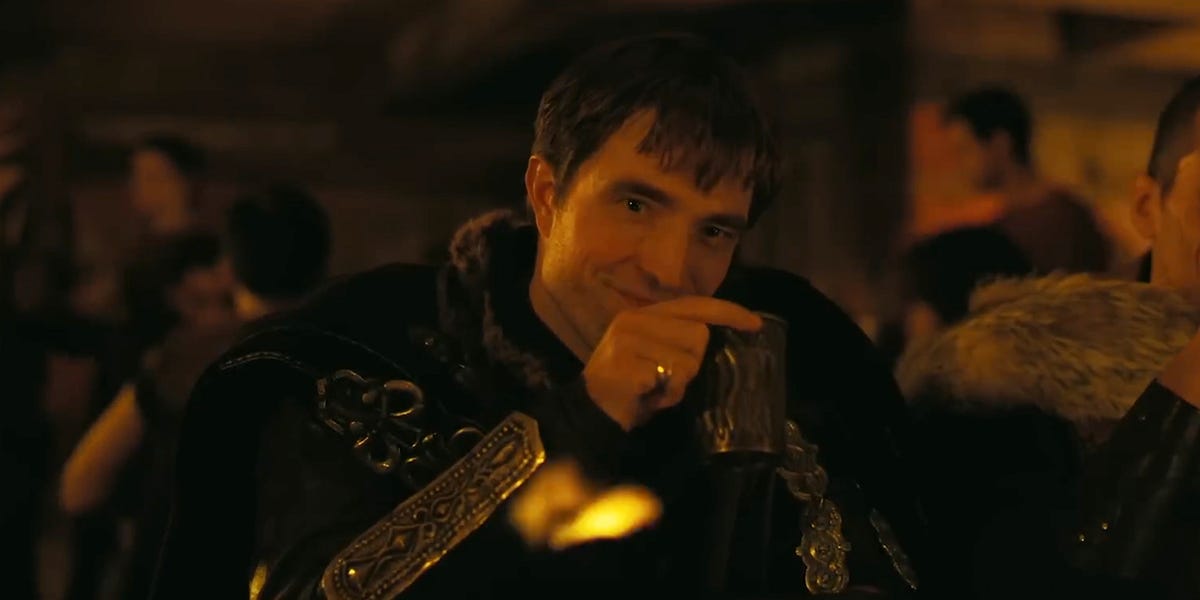 The Odyssey's Robert Pattinson said he did "slithery things" with Tom Holland