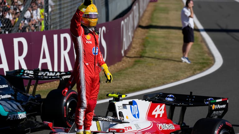 Ferrari driver Lewis Hamilton of Britain celebrates after setting a pole position for the sprint race at the British F1 Grand Prix, in Silverstone, England, Friday, July 3, 2026.