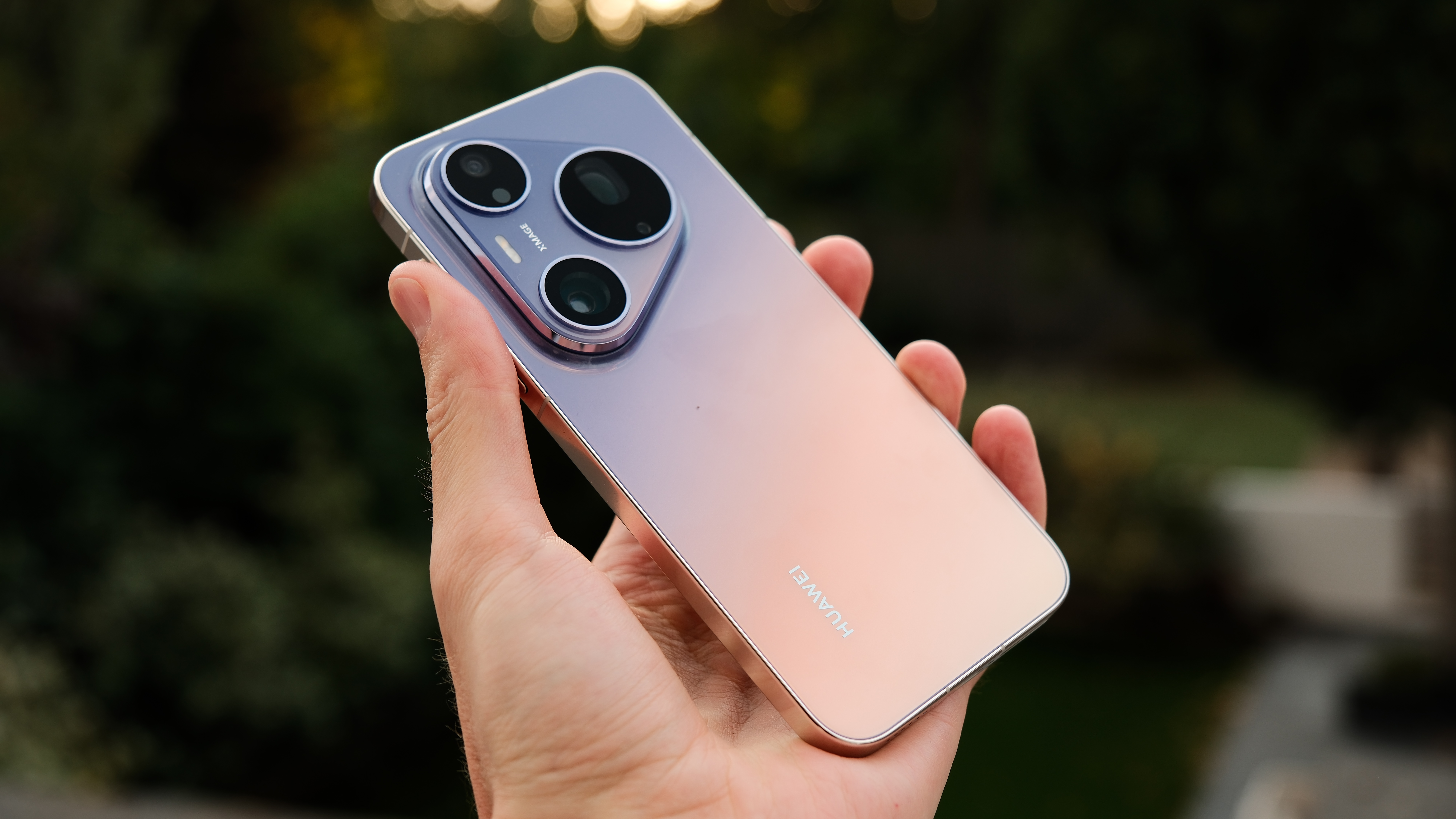 Huawei Pura90s Pro Max smartphone held in a hand