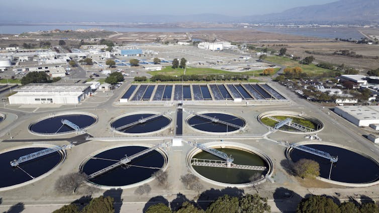 large circular pools of water at an industrial facility