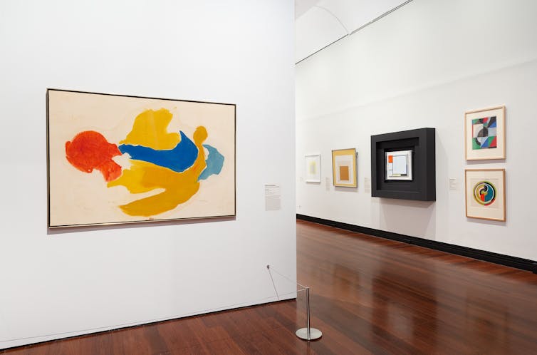 Gallery featuring a painting by Modrian.
