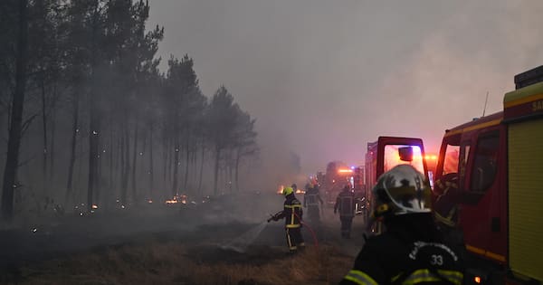 Macron calls crisis meeting as wildfires drive 250,000 from their homes