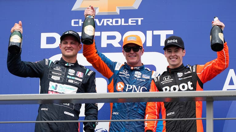 From left, second placed Marcus Ericsson, first placed Scott Dixon, and third placed Marcus Armstrong celebrate after the IndyCar Detroit Grand Prix auto race in Detroit.