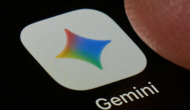 A macro close-up photograph shows the Google Gemini AI app icon