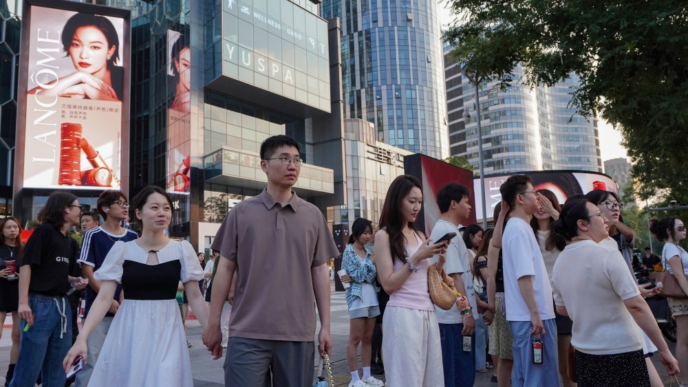 Shoppers at Beijing's Sanlitun shopping district.