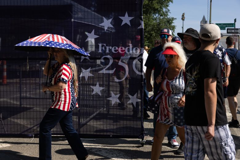 Visitors arrive for the Great American State Fair on the National Mall during a celebration of America's 250th Independence Day on July 4, in Washington, DC.