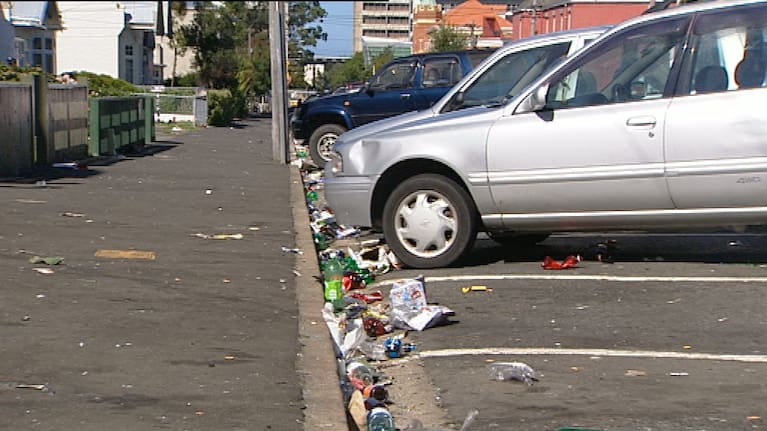 Glass bottles litter a street in Dunedin's student quarter.