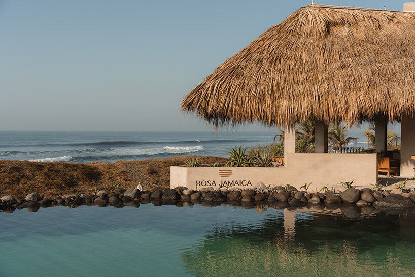 gris shapes naturally cooled beach club around series of open-air pavilions in guatemala - 2