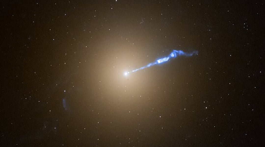 The powerful jet emanating from the supermassive black hole at the center of the M87 galaxy. Credit: NASA/ESA/STScI