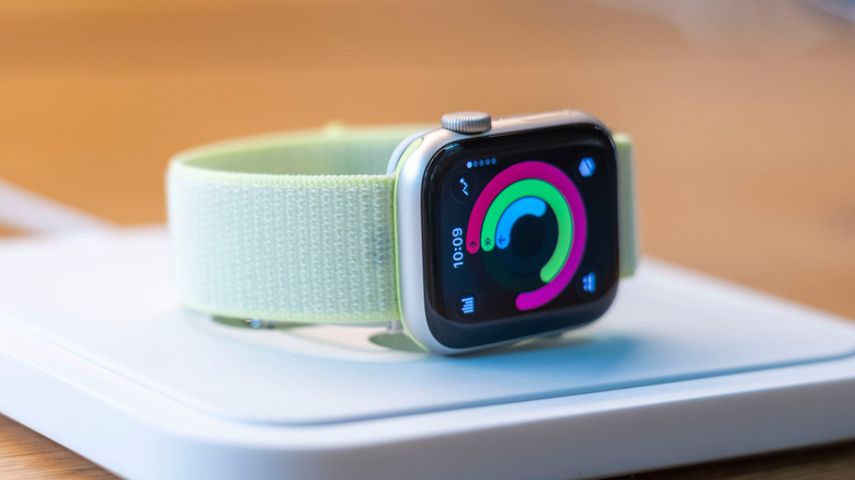 An Apple Watch on a charging stand.