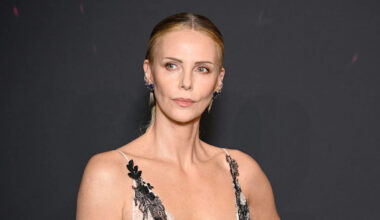 Charlize Theron, 50, stuns in plunging lace gown on red carpet