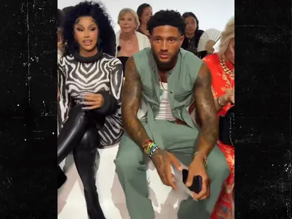Nigerian Soccer Star Maduka Okoye Helps Cardi B At Paris Fashion Week
