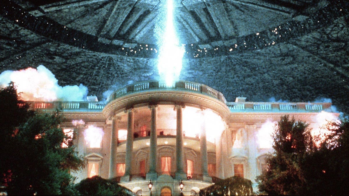 The White House with a flying saucer over it