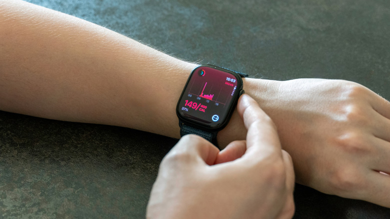 Pressing the button of an Apple Watch