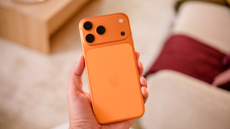 Hand holding an iPhone 17 Pro