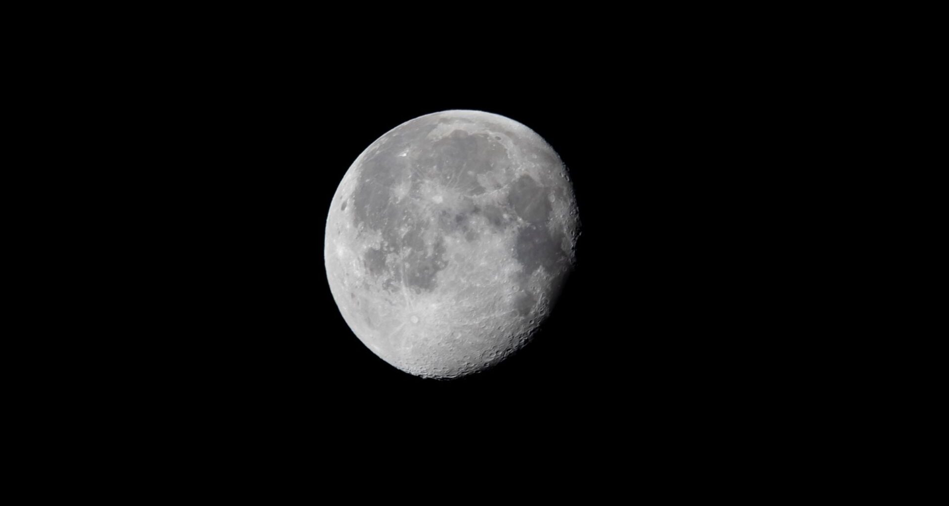 The moon is drifting away from Earth by about 3.8 centimetres a year — measured to the millimetre by bouncing laser light off mirrors the Apollo astronauts left sitting in the lunar dust more than half a century ago