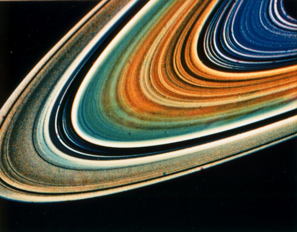 This enhanced-color view of Saturn's rings, taken by Voyager 2 in August 1981, shows possible differences in composition.
