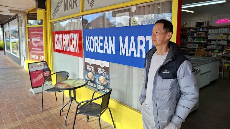 James Kim outside his Korean Mart store on the corner of Hinemaru and Hinemoa Sts.