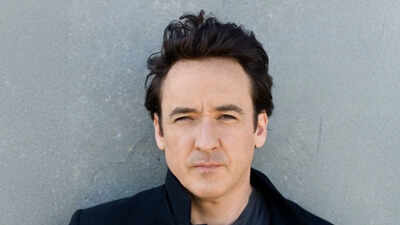 John Cusack calls graphic novels 'so cinematic' as he shifts from acting to writing: 'They were closest things to film'