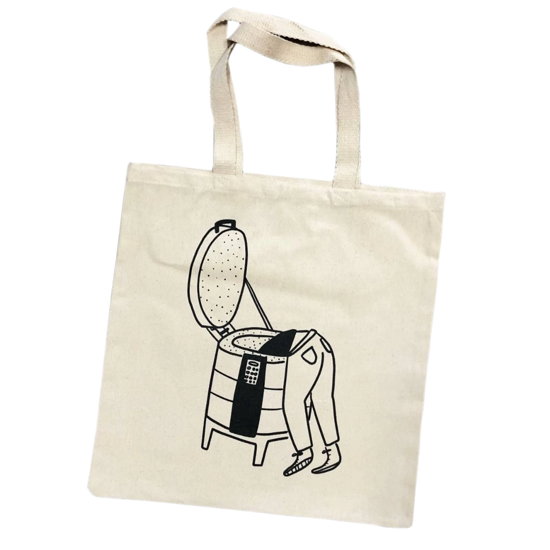 a tote with an illustration of a person loading a kiln