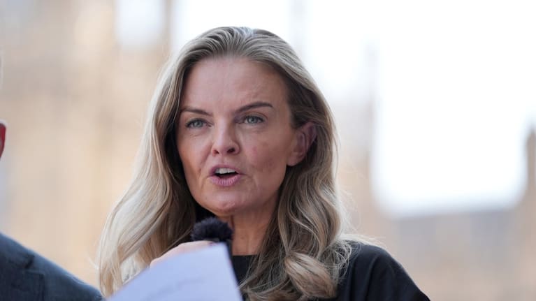 Laura Enston, granddaughter of Ruth Ellis, makes a statement to the media outside the Houses of Parliament, London.