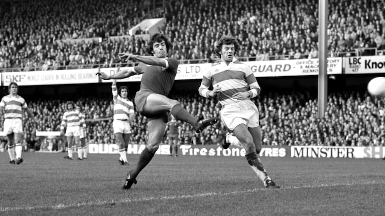 Liverpool striker Kevin Keegan gets a tremendous shot at goal despite the attentions of Ian Gillard, the Queen Park Rangers defender in 1974.