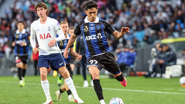 Auckland FC attacker Logan Rogerson strikes the ball.