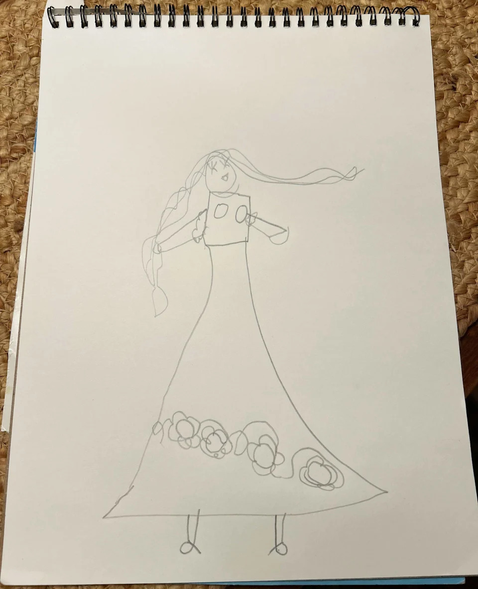 A simple pencil sketch of a bride wearing a long wedding dress with a flowing veil.