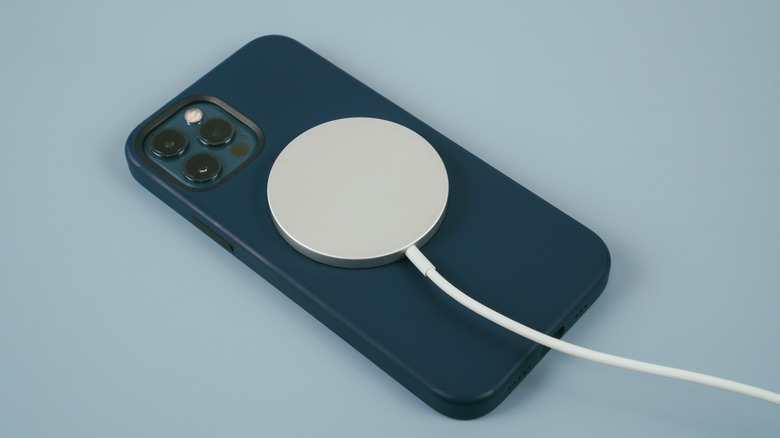 Apple MagSafe Charger attached to an iPhone 13 Pro Max.