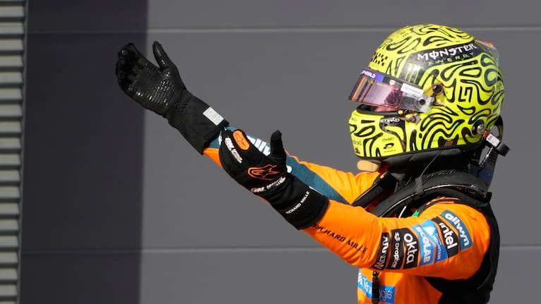 McLaren driver Lando Norris of Britain celebrates after winning the Formula One Hungarian Grand Prix auto race, at the Hungaroring racetrack in Mogyorod, near Budapest, Hungary.