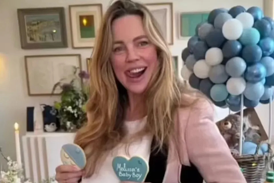 Pregnant Melissa George at a baby shower for her third child.