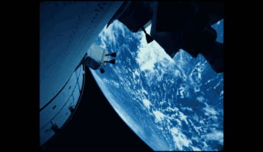 a gif of Artemis II rotating above the earth