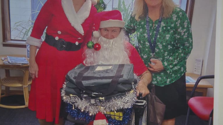 Michael Turner dressed up as Santa.