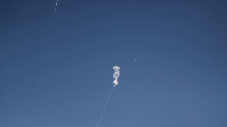 Missiles are intercepted over Doha, following explosions during a missile attack on July 17. .