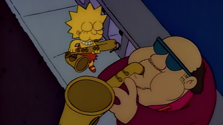 Lisa plays the saxophone with Bleeding Gums Murphy in 